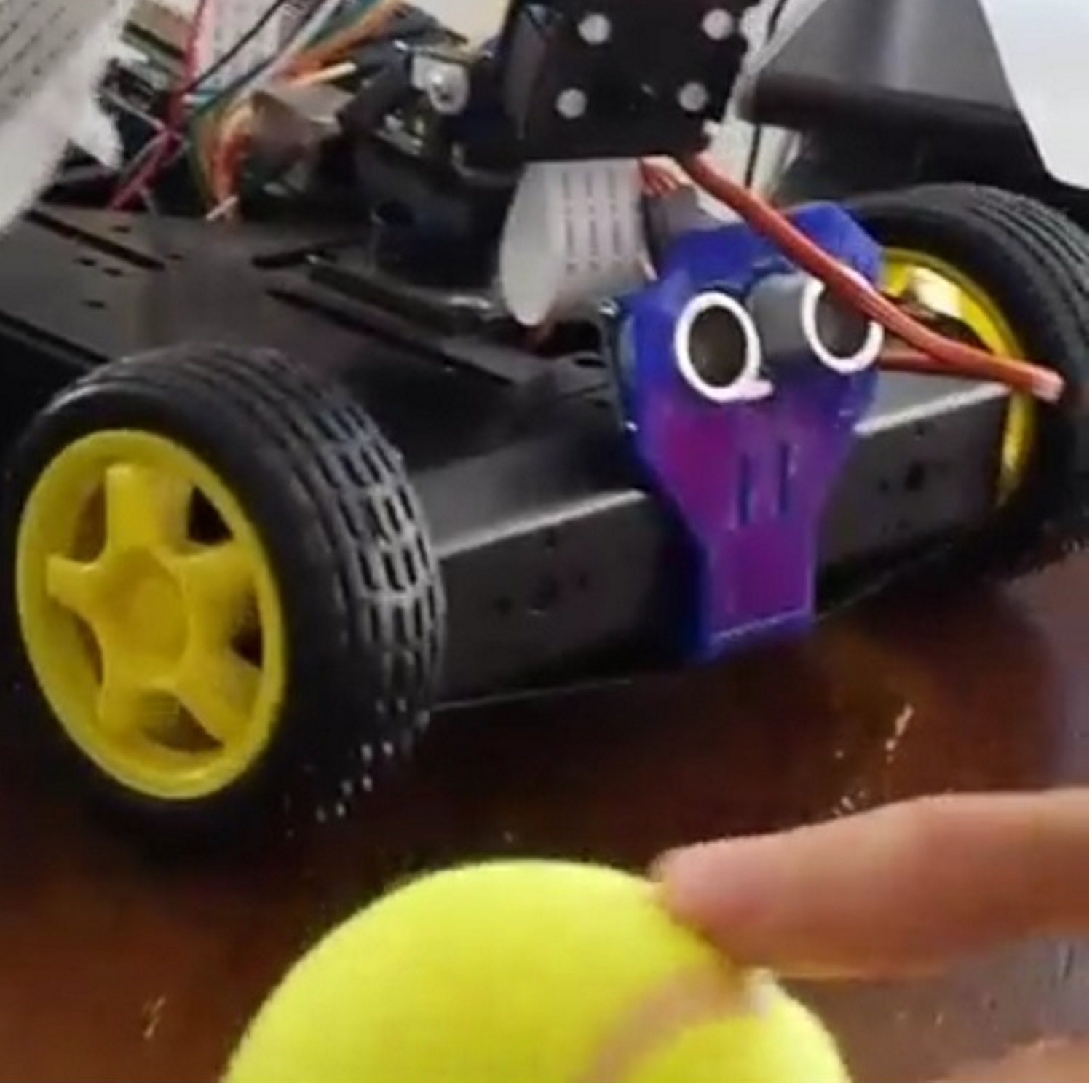 Raspberry pi tennis ball tracking robot
